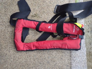 2 old life jackets