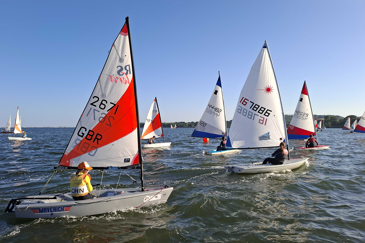 Mixture of youth single-handers on the water